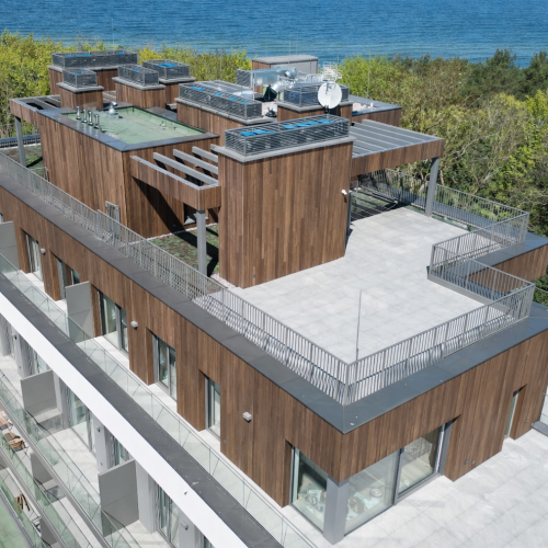 Sand Dunes Dziwnów deska elewacyjna Thermo Jesion profil zetka, zabezpieczona do NRO